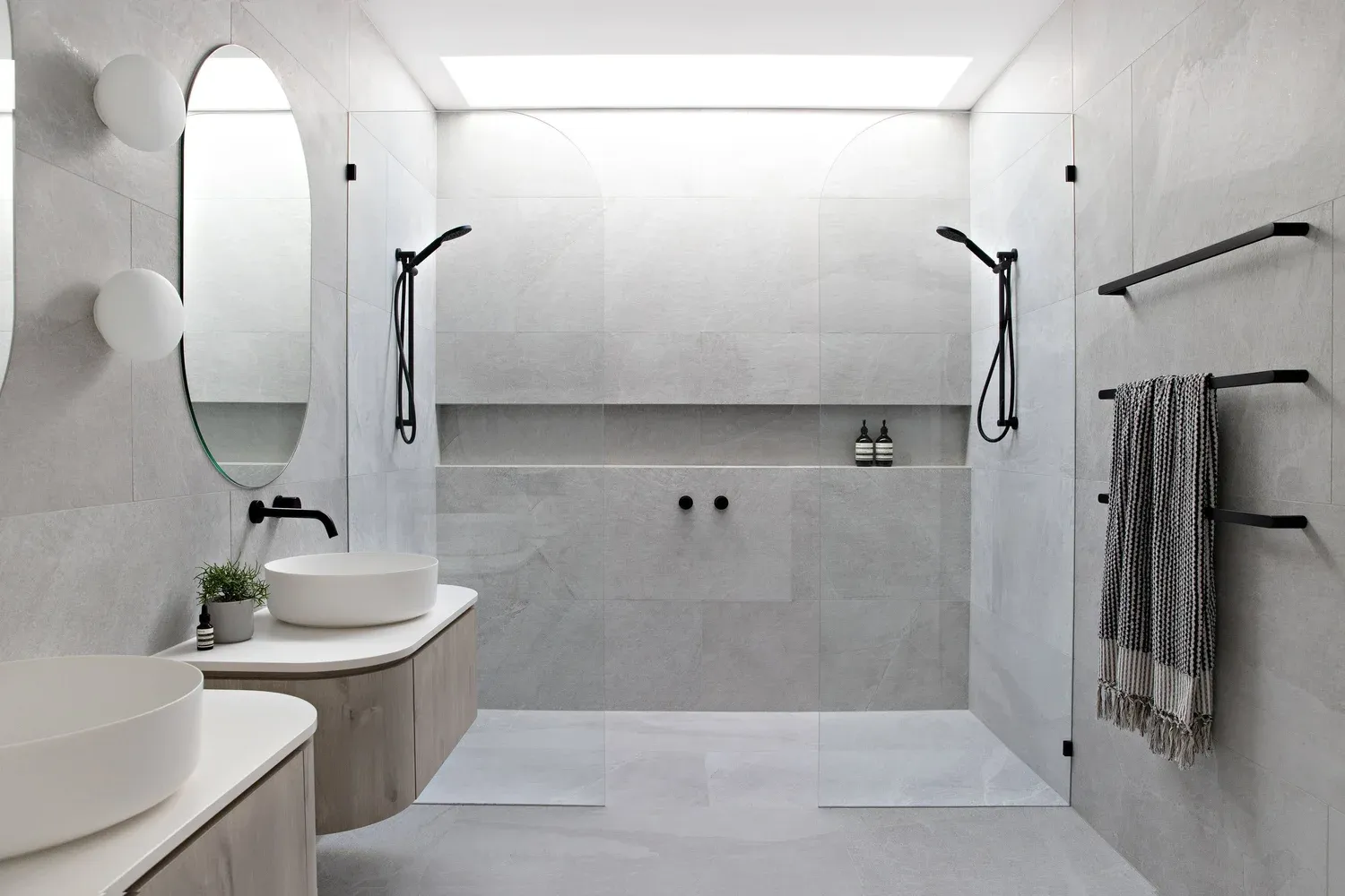 Bathroom design study with a timber vanity and glass shower