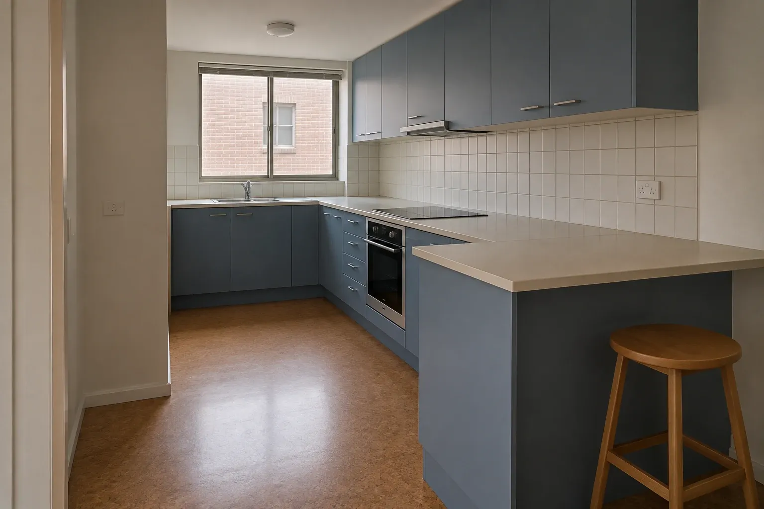 Denim blue in a compact apartment — kitchen design inspiration