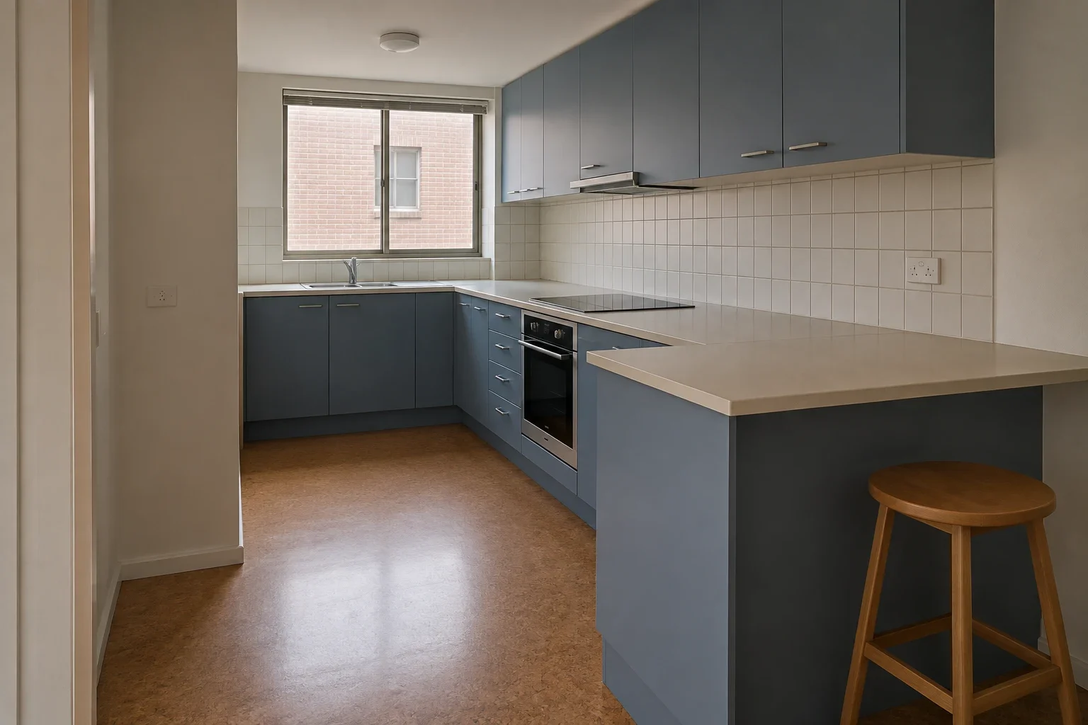 Denim blue in a compact apartment — kitchen design inspiration