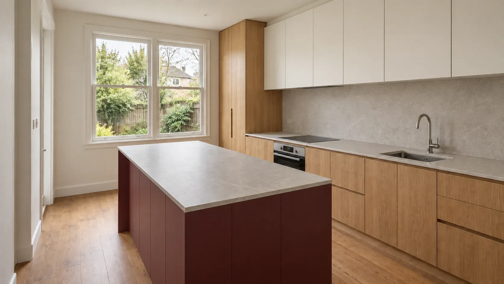 An oxblood island with natural oak — kitchen design inspiration