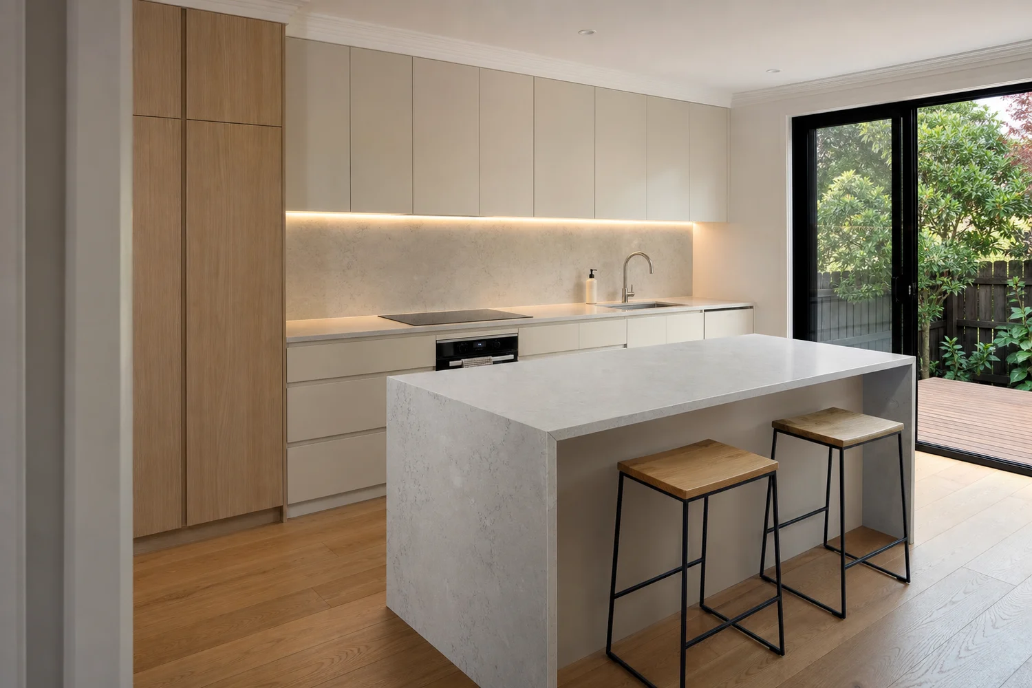 kitchen with pale cabinetry, oak detailing and garden connection
